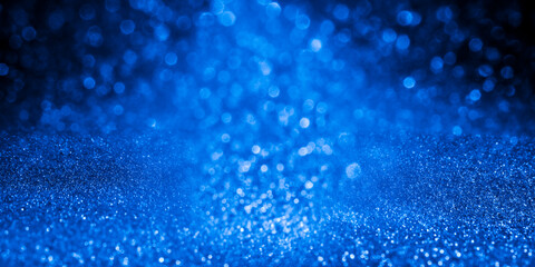 Majestic blue-purple sparkle snow. Christmas background for design, cards, posters. Cosmic star explosion.
