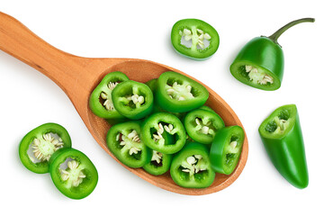 sliced jalapeno pepper in wooden bowl isolated on white background. Green chili pepper with...