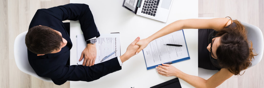 Two Businesspeople Shaking Hand