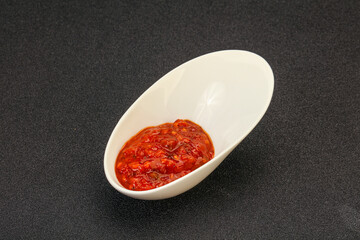 Tomato spicy sauce in the bowl