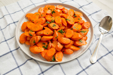 Homemade Sauteed Carrots on a plate, low angle view.