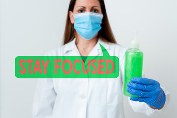 Word writing text Stay Focused. Business photo showcasing Be attentive Concentrate Prioritize the task Avoid distractions Laboratory blood test sample shown for medical diagnostic analysis result