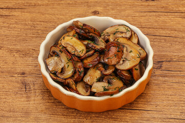 Roasted champignon with herbs and spices
