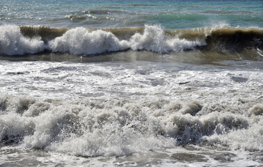 Sea waves on clear sunny day