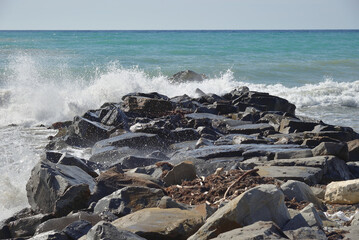 Sea waves lapping on rocky coast