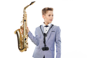 Fototapeta premium Boy musician playing saxophone performing jazz 