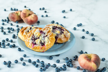 Buns with currant filling sprinkled with blueberries