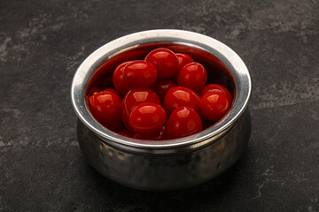 Pickled cherry tomatoes in the bowl
