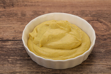 Dijon mustard sauce in the bowl