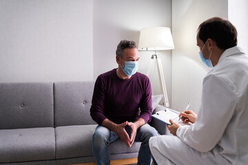 Doctor Talking To Senior Patient Older Man