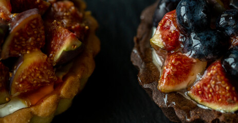 shortbread with fresh figs on a dark surface