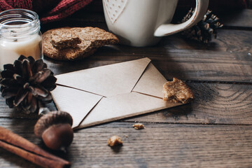 Christmas letter for Santa Claus. Scandinavian hygge styled Christmas composition. Cozy winter homely scene. Santa Claus working place. Flatlay. Home decor.