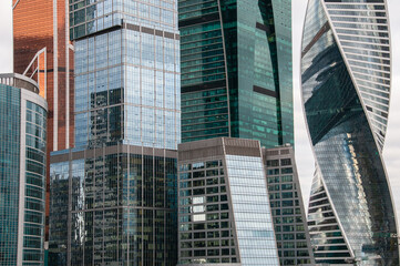 Skyscraper towers close up, reflections