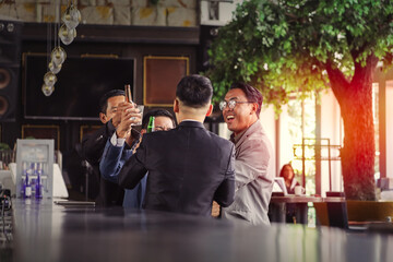 Executive business people greeting and meeting with partner or friends, alcohol drink hang out party and smile cheers together after work