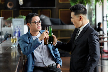 Executive business people greeting and meeting with partner or friends, alcohol drink hang out party and smile cheers together after work