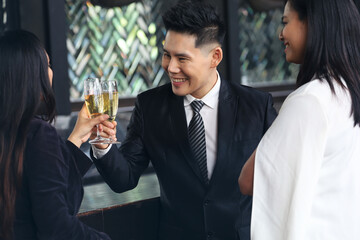 Executive business people greeting and meeting with partner or friends, alcohol drink hang out party and smile cheers together after work