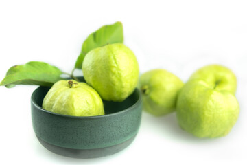 Fresh guavas fruit with leaf on a white background