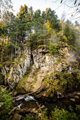 Large rocks in the mountains with texture and moss in the humid forest