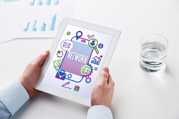 Man with tablet, network icons