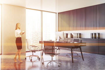 Young woman in white CEO office