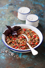 Khorovats. Traditional caucasian salad with grilled vegetables in enamel bowl, selective focus