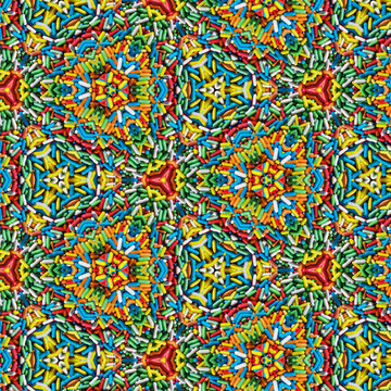 Colorful candy seamless pattern created from real picture of sugar coated candy pills with kaleidoscope effect. High resolution at 3000 by 3000 pixel