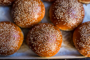 close up of burger buns with sesame seeds