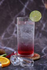 cocktail with ice and cherry