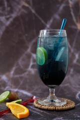 cocktail with ice and cherry