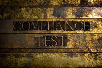 Compliance Test text message on textured grunge copper and vintage gold background