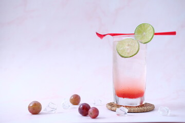 cocktail with lime and cherry