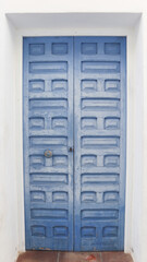 Fototapeta premium colored wooden doors with metal knobs