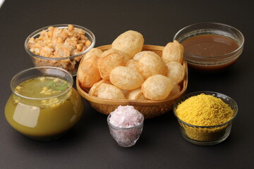 indian traditional food name pani puri or Golgappa, gol gappa or panipuri, the indian chat food. - obrazy, fototapety, plakaty