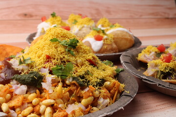group of Bombay chat food includes  bhel-puri, sev-poori, dahipuri.