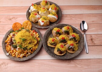 group of Bombay chat food includes  bhel-puri, sev-poori, dahipuri.