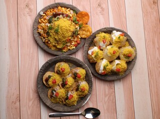 group of Bombay chat food includes  bhel-puri, sev-poori, dahipuri.