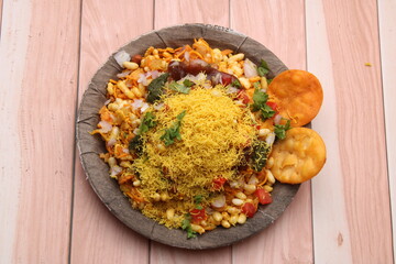 Bhelpuri Chaat/chat is a road side tasty food from India, served in a plate.