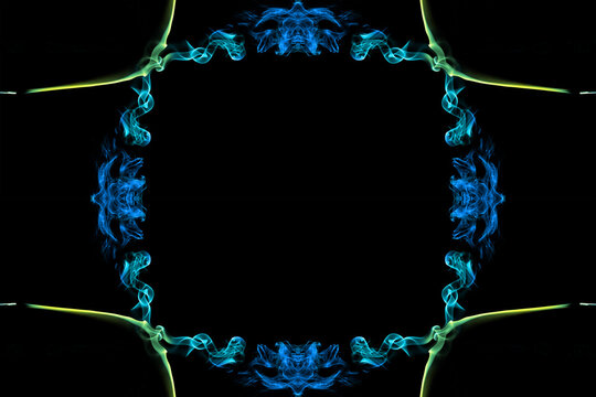 Frame and ornament of turns and swirls of colored smoke on black background. Framing for your text.