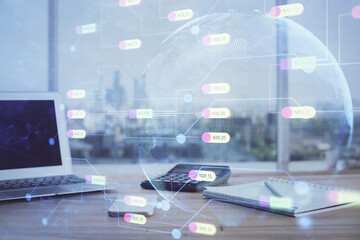 Double exposure of desktop computer and technology theme hologram. Concept of software development.