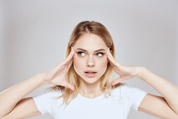 Fototapeta premium emotional blonde white t-shirt close-up studio lifestyle fun