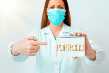 Writing note showing Portfolio. Business concept for securities held by an investor, paper held by...