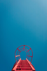 Marina di Ravenna, Ravenna / Italy - August 2020: Bottom view of the red lighthouse of the Zaccagnini pier