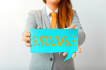 Writing note showing Sustainable. Business concept for the ability to be sustained, supported,...