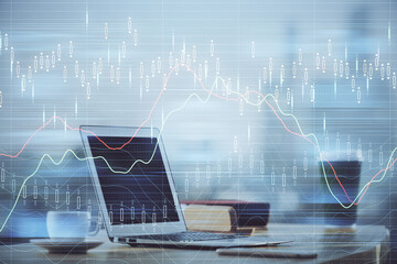 Forex market chart hologram and personal computer background. Multi exposure. Concept of investment.
