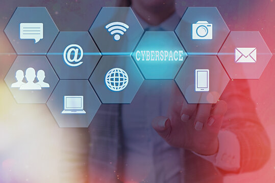Writing note showing Cyberspace. Business concept for the online world of computer networks and especially the Internet Grids and different icons latest digital technology concept