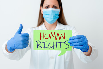 Word writing text Human Rights. Business photo showcasing Moral Principles Standards Norms of a...