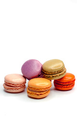 Macaroons isolated on the white background. Homemade french style colorful macaroons.Concept of sweet food and desserts.