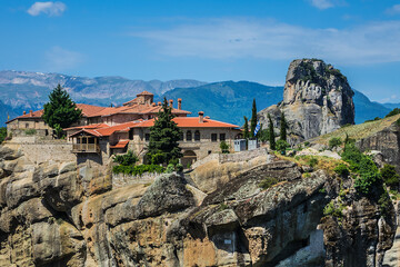 Fototapeta na wymiar Rock cliffs (60 million years old) in deltaic plains of Meteora. Cliffs rise to a height of 400 meters. They situated in Pineios Valley within Thessalian plains close to town of Kalambaka. Greece.