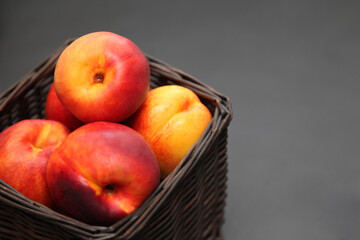 peach nectarine on wooden background