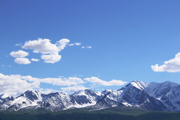 Fototapeta na wymiar Snow-capped mountain range in the Altai steppe